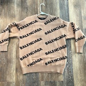 Balenciaga all over logo wool sweater.